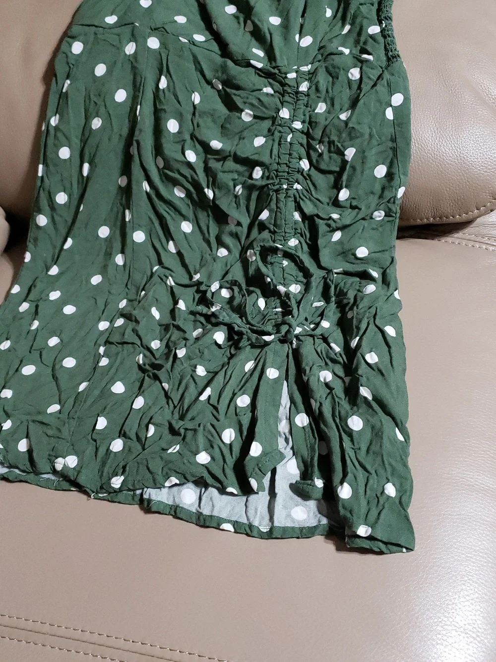 Aéropostale polka dot sundress featuring a ruched design and adjustable straps.